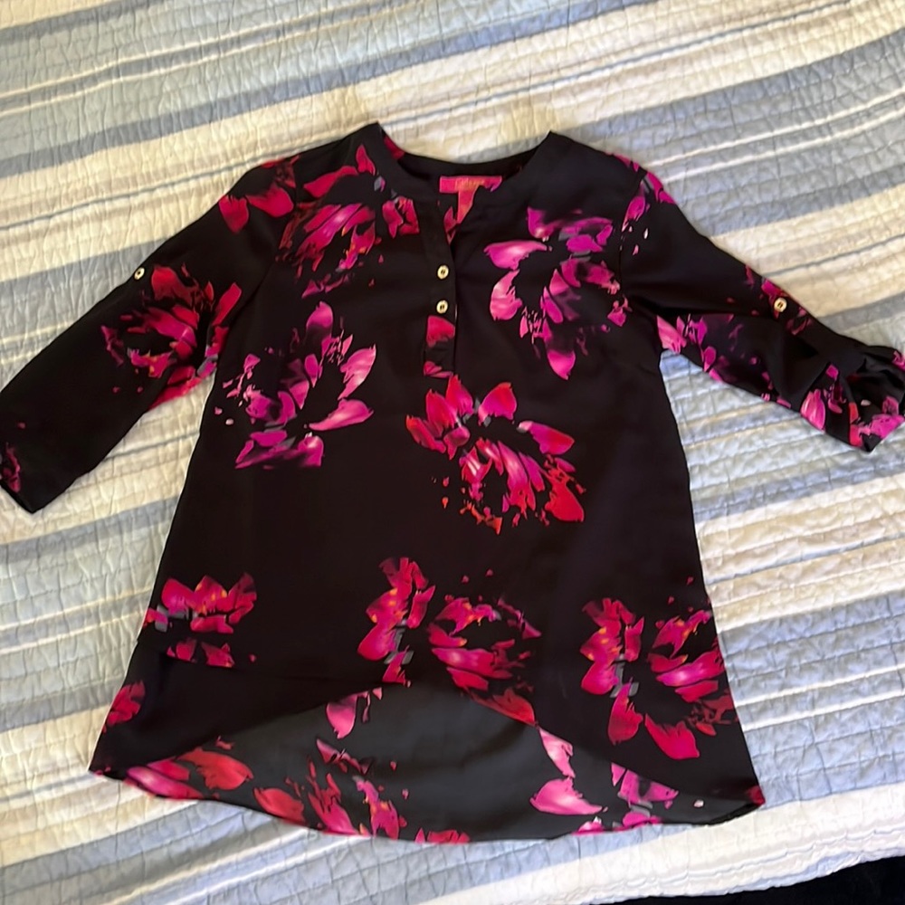 Black/Pink/Red blouse. Asymmetrical short in front longer in back. Long sleeve